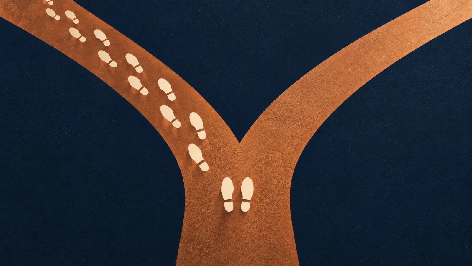A single pair of footprints pauses where a path forks, while many footprints follow one branch